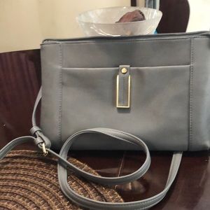 Kenneth Cole pocket book